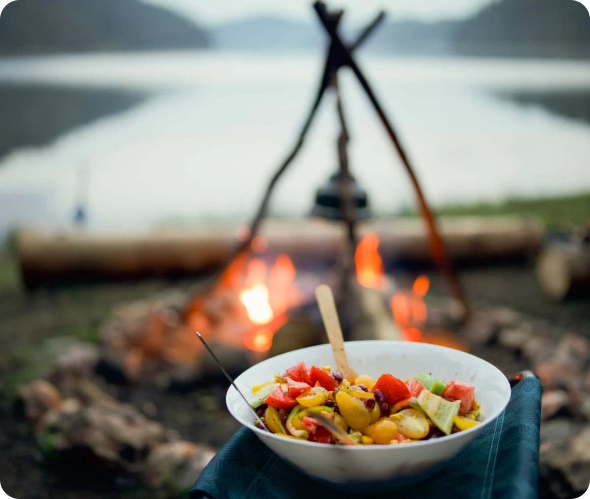 Colorful salad near outdoor fire